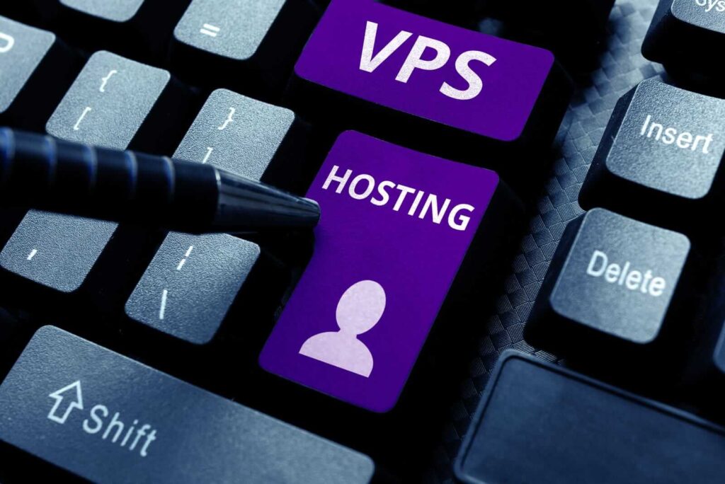 A computer keyboard with purple keys labeled "VPS" and "HOSTING" alongside a user icon; a pen points toward the keys, highlighting the option to buy a NVMe VPS.
